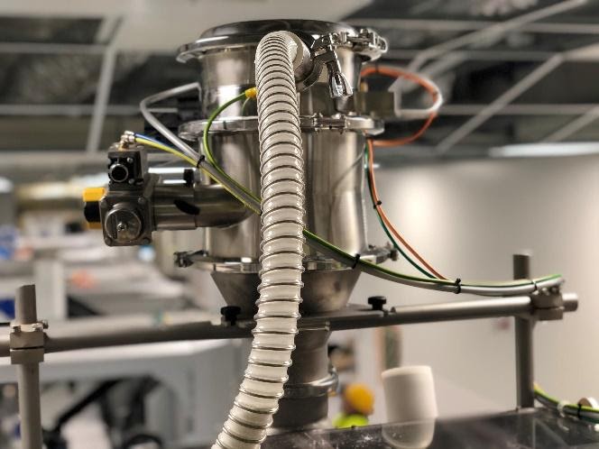 Alimentation d’une machine a remplir les sticks